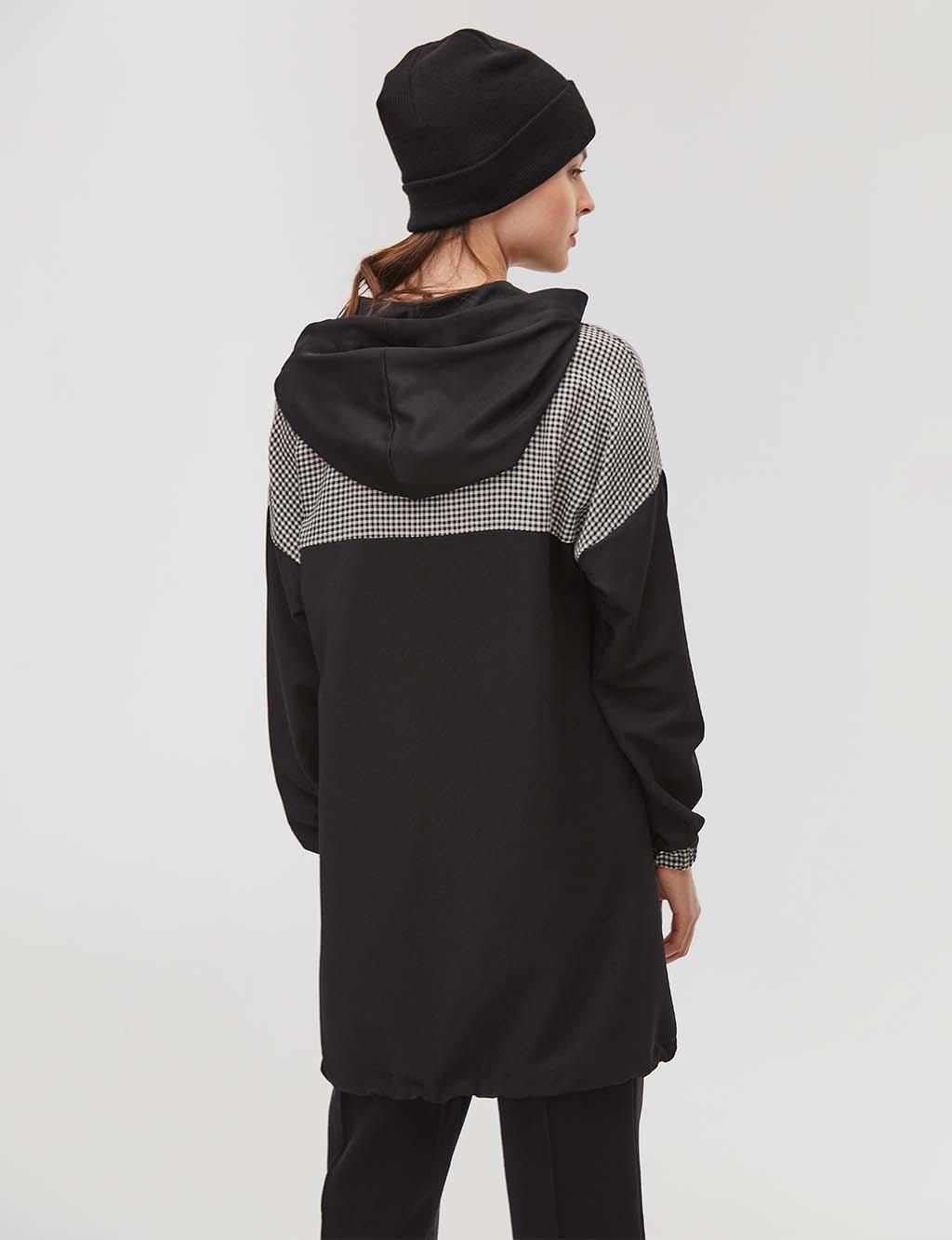 black hooded tunic