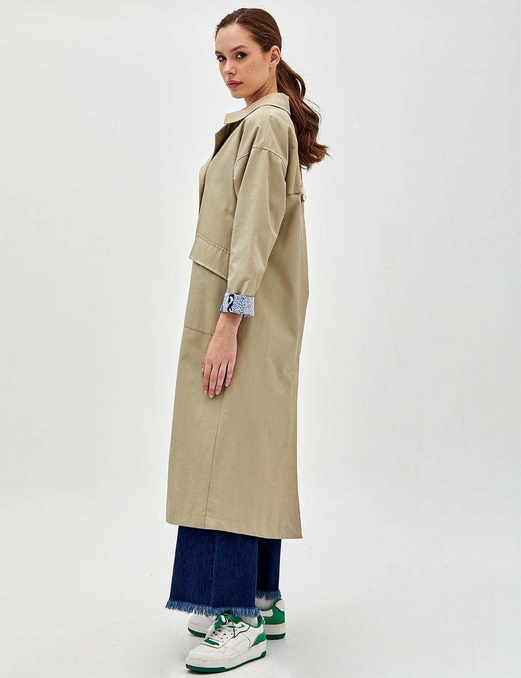 Trench Coat with Embroidery Detail on the Back Mold Green