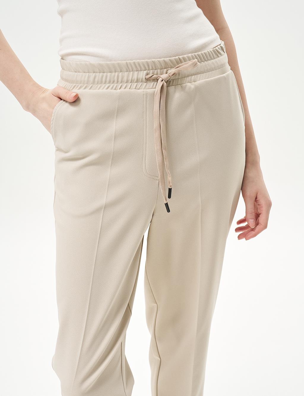 Elasticated Waist Carrot Pants in Stone