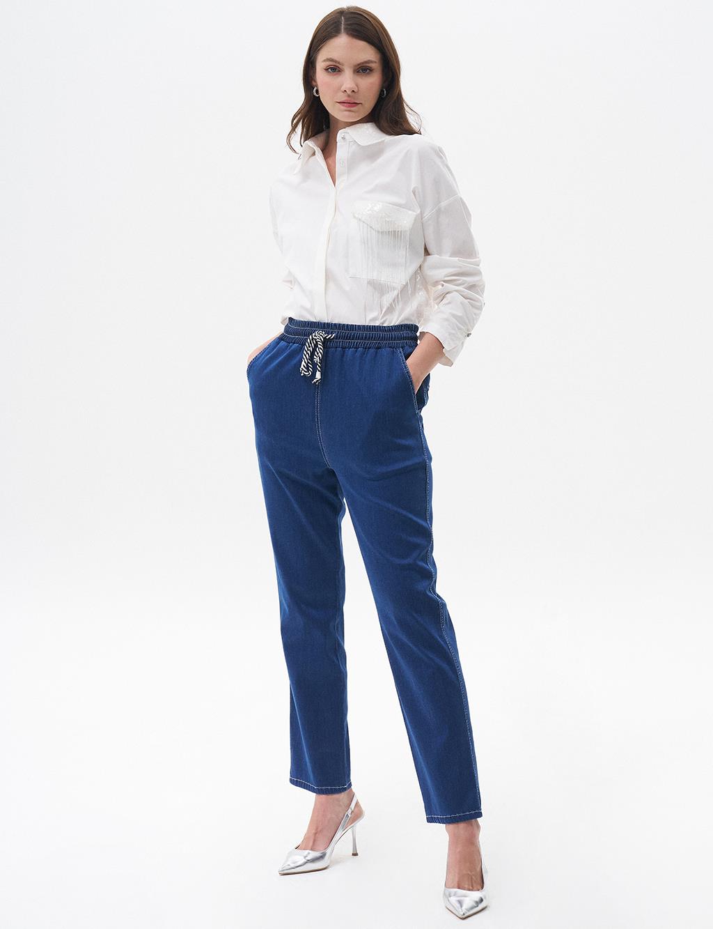 Carrot Cut Lyocell Trousers Navy Blue