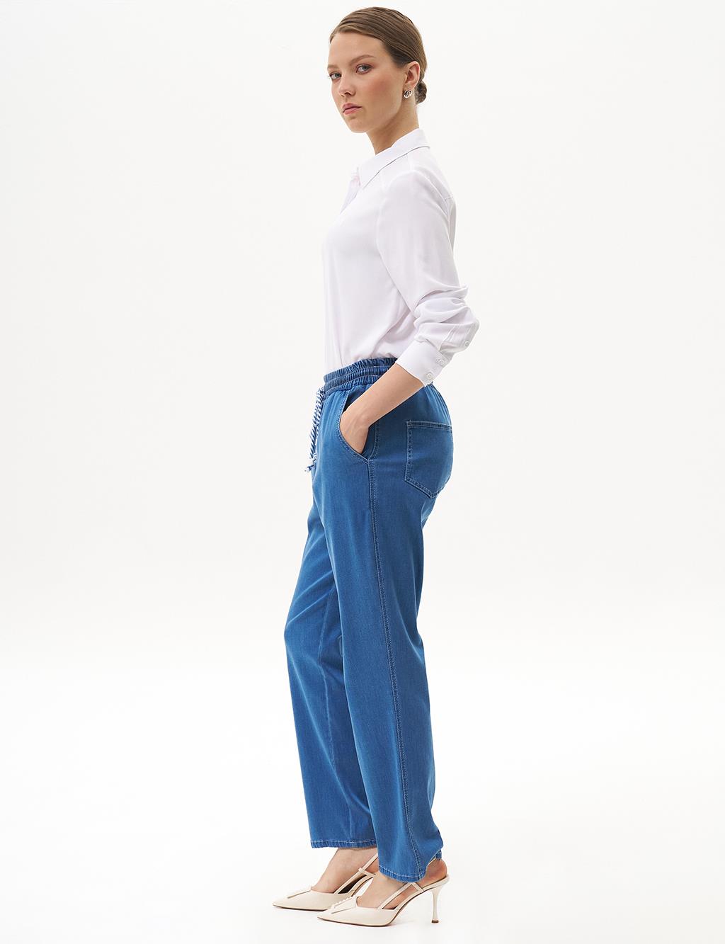 Carrot Cut Lyocell Trousers Indigo