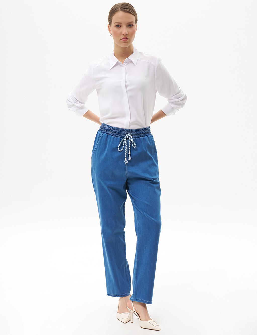 Carrot Cut Lyocell Trousers Indigo