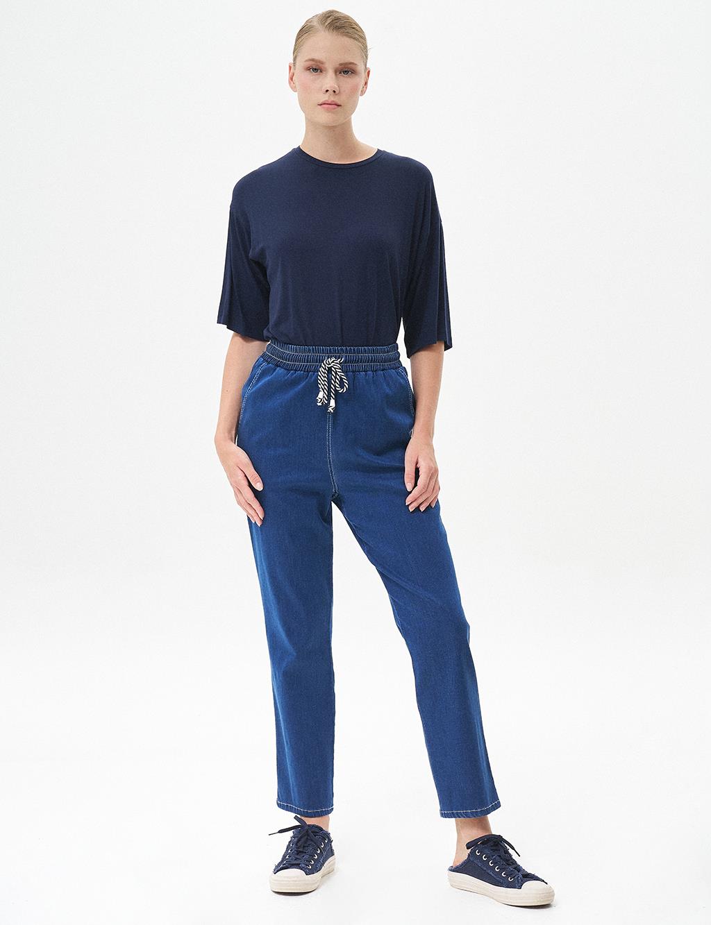 Carrot Cut Lyocell Trousers Navy Blue