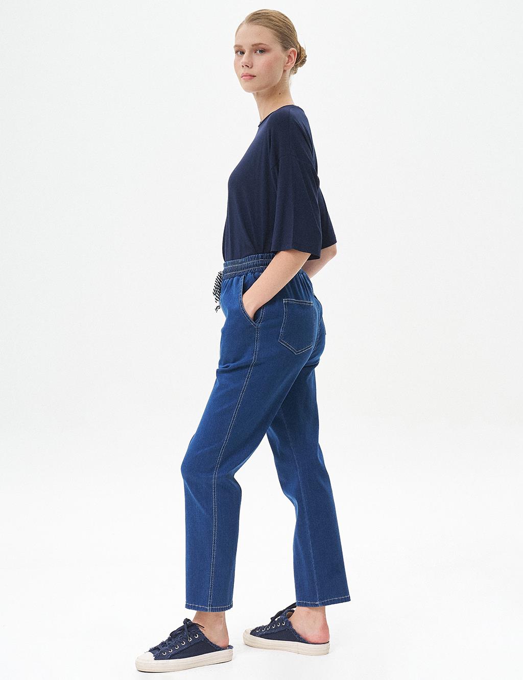 Carrot Cut Lyocell Trousers Navy Blue