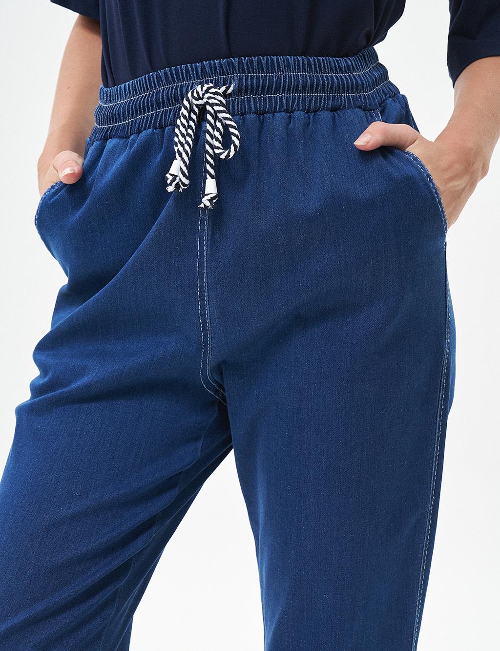 Carrot Cut Lyocell Trousers Navy Blue