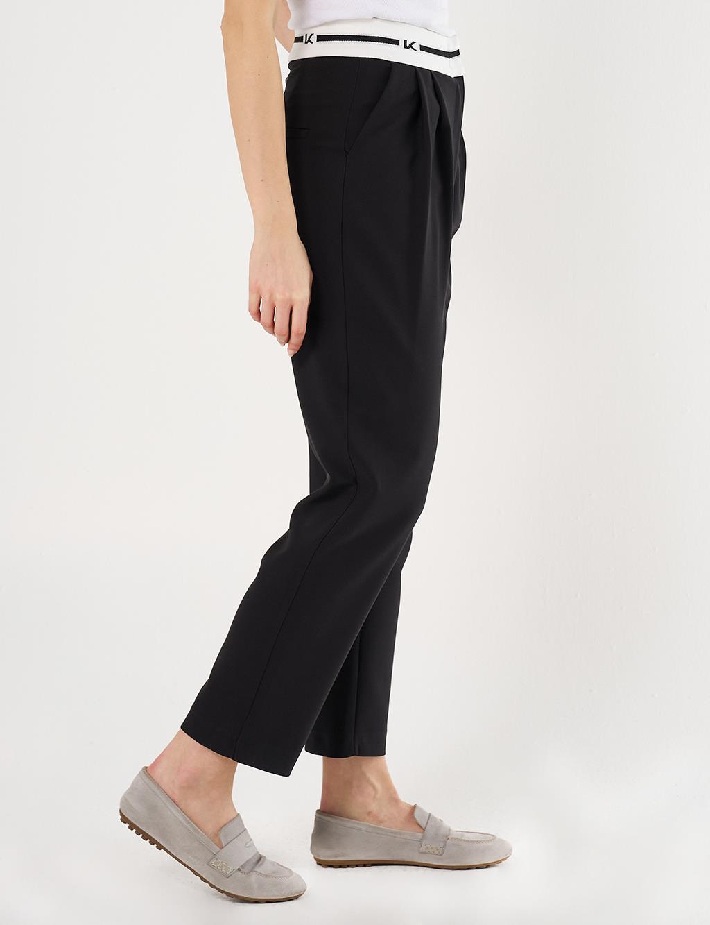 Logoed Carrot Cut Pants - Black