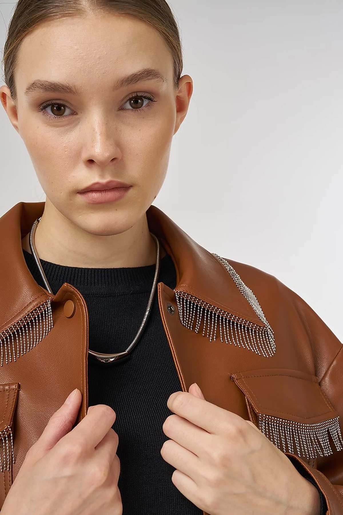 Faux Leather Jacket with Dangling Detail in Brown