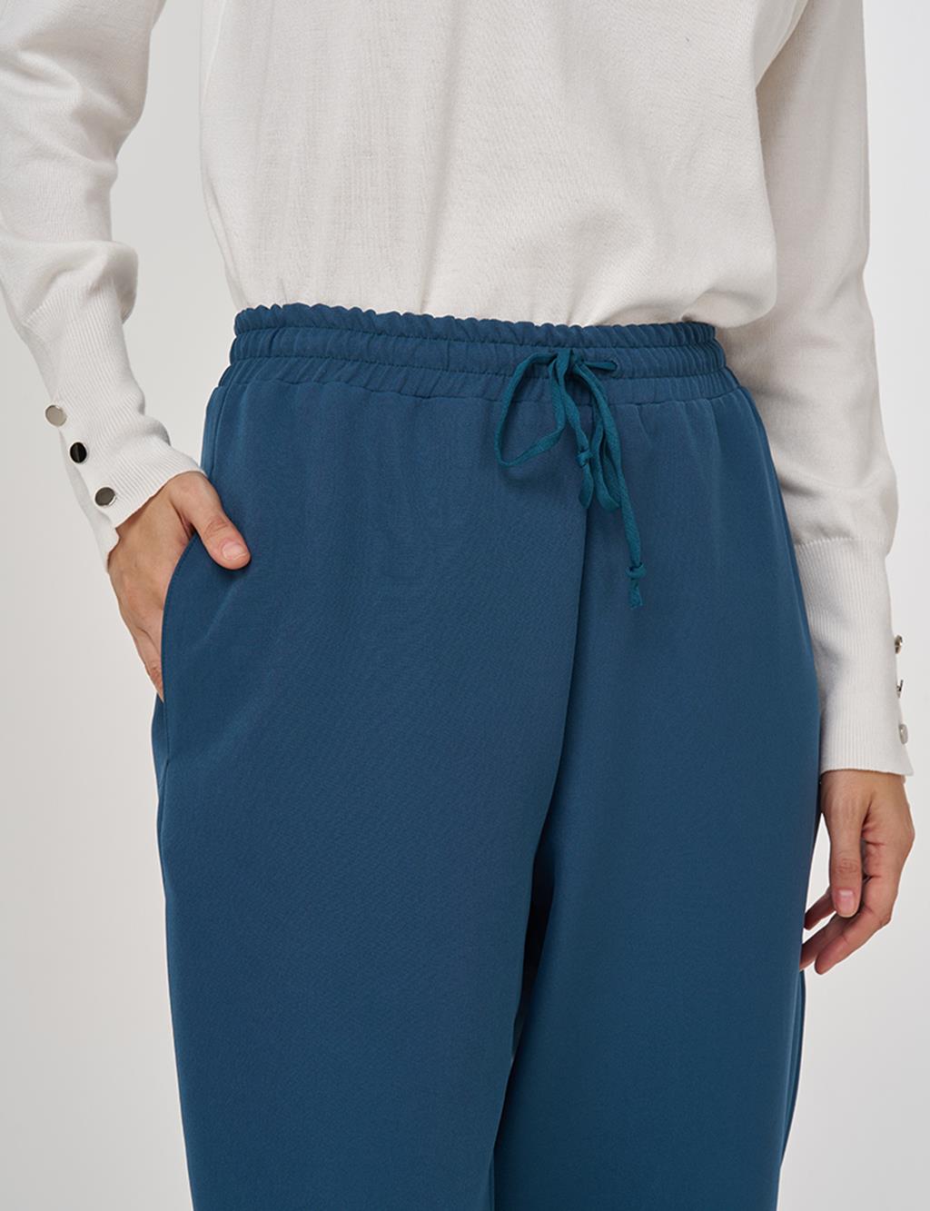 Beli Lastikli Rahat Kesim Pantolon Petrol 