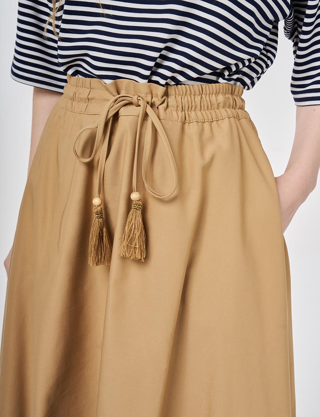 Püsküllü Evaze Etek Bej