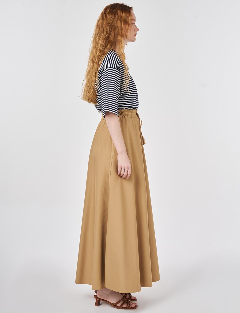 Püsküllü Evaze Etek Bej