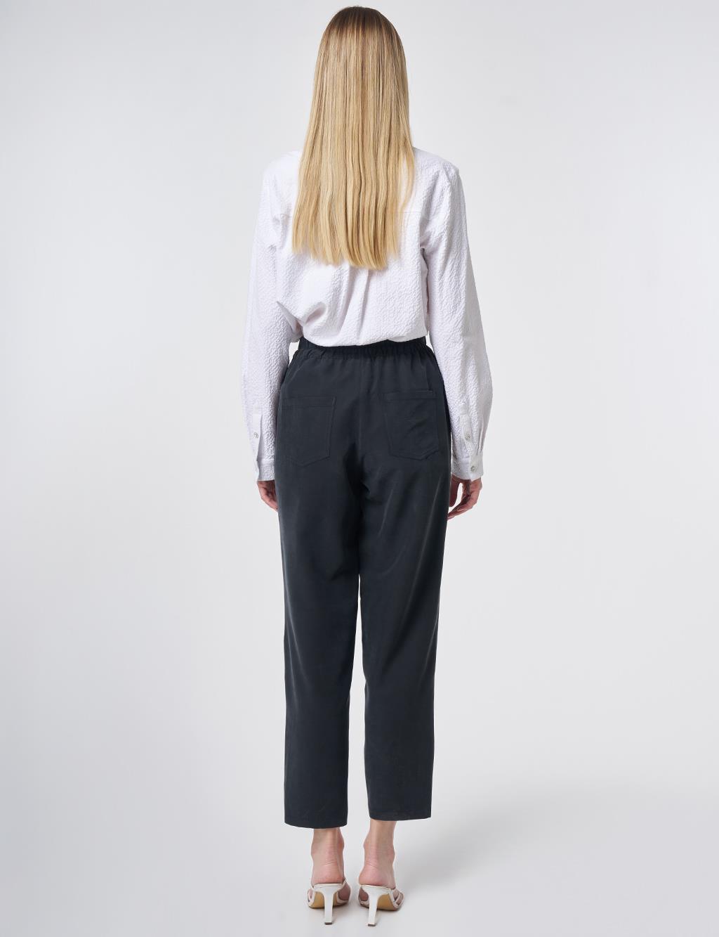 Metallic Printed Modal Carrot-Fit Trousers – Black