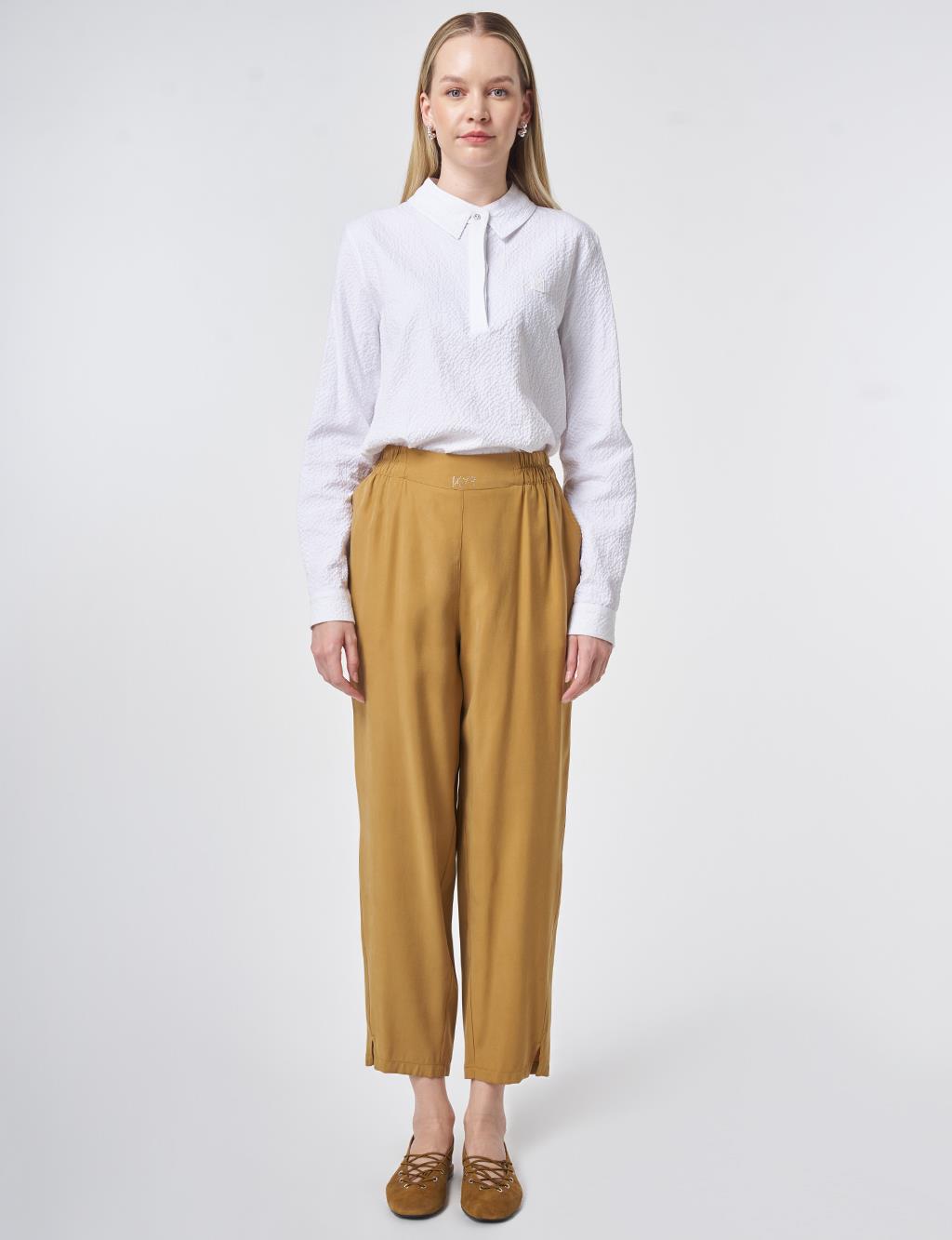 Metallic Printed Modal Carrot-Fit Trousers – Dark Mustard