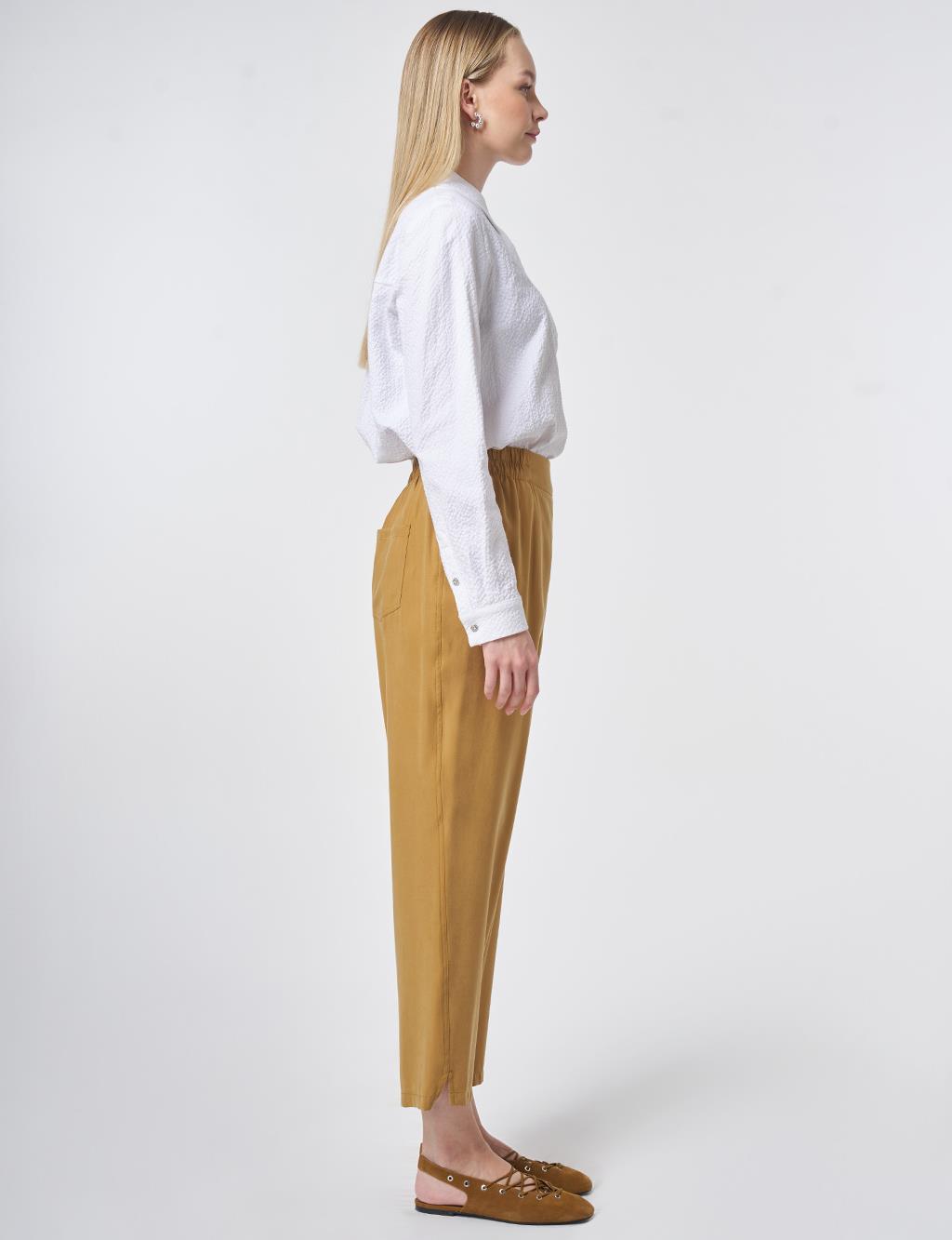 Metallic Printed Modal Carrot-Fit Trousers – Dark Mustard
