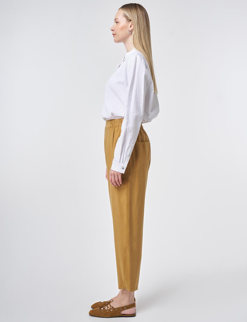 Metallic Printed Modal Carrot-Fit Trousers – Dark Mustard